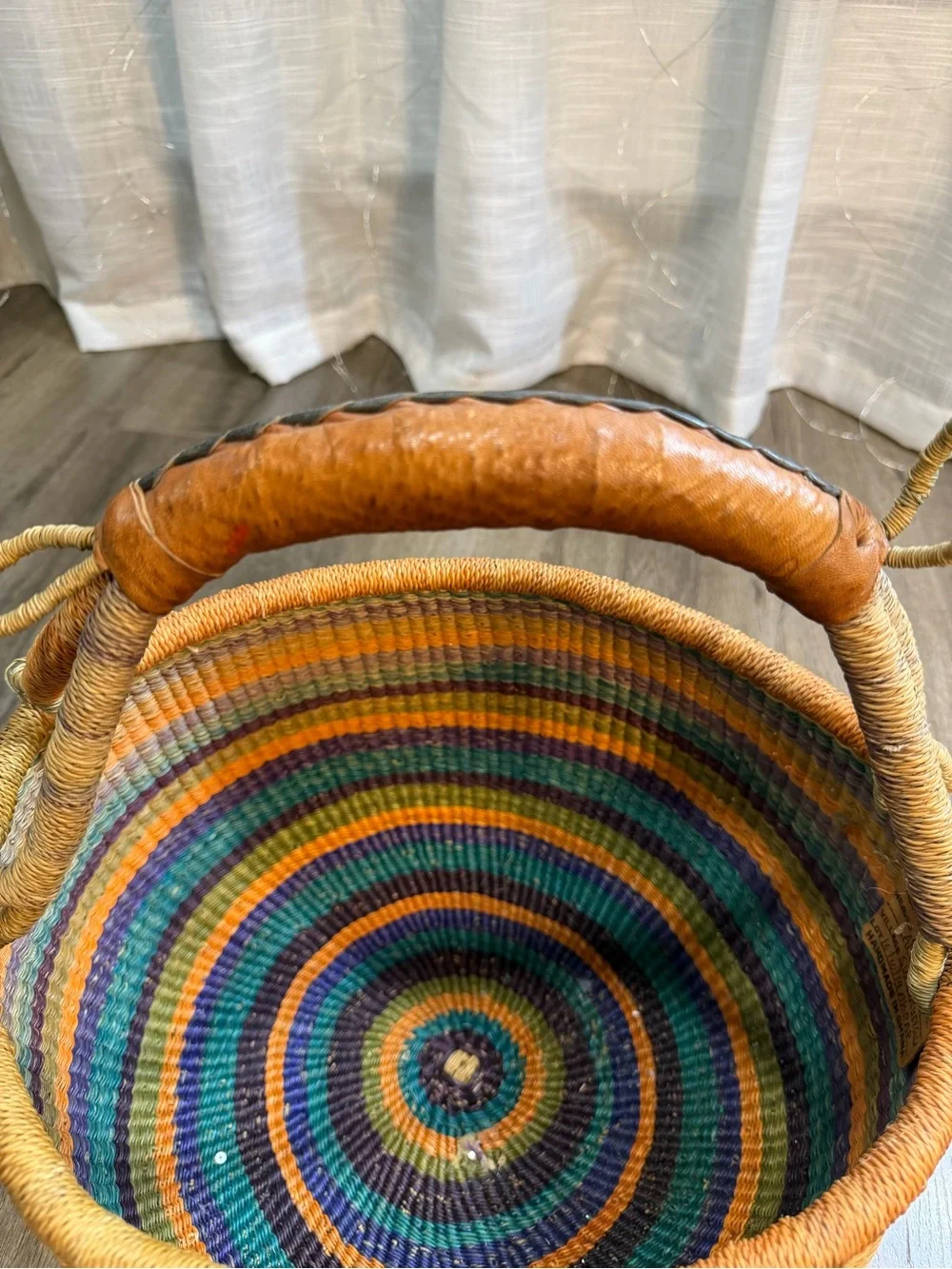 Large handmade vintage shopping basket with a leather handle.